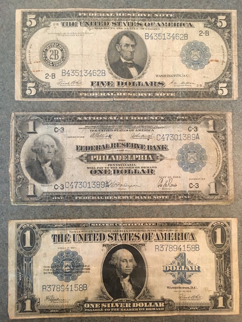 A-Set-Of-Early-US-Currency-Including-Black-Eagles,-Educational-$2,-Etc